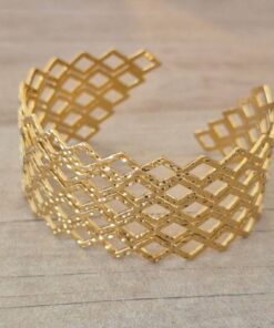 PULSERA DE ACERO DORADO ESCLAVA ABIERTA TRABAJADA