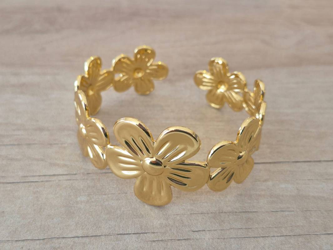 PULSERA DE ACERO DORADO ESCLAVA ABIERTA TRABAJADA