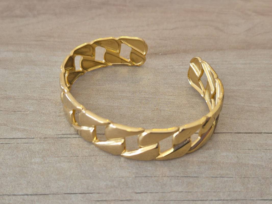 PULSERA DE ACERO DORADO ESCLAVA ABIERTA TRABAJADA