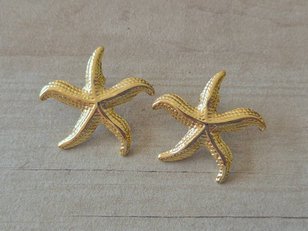 ARO DE ACERO DORADO ESTRELLA DE MAR CON FRU FRU. TAMAÑO 33 MM