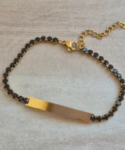 PULSERA DE ACERO DORADO TIRA DE STRASS 3.5 MM NEGRO, CON CHAPA 32 X 5 MM PARA GRABAR. LARGO 18 + 5 CM EXT.
