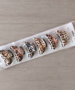BROCHES DE PLÁSTICO DORADO MEDIANOS ESTAMPADOS ANIMAL PRINT X 6 UNIDADES. MEDIDA 70 MM.